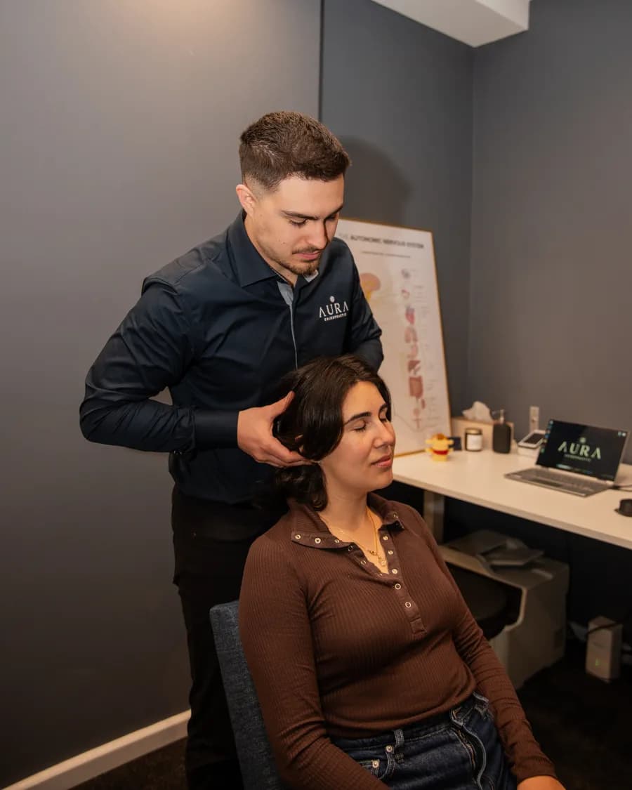 An upper neck examination at Aura Chiropractic in Toorak