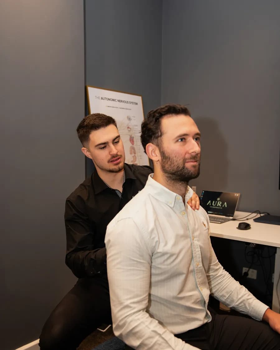 A patient at Aura Chiropractic in Toorak during a nervous system assessment